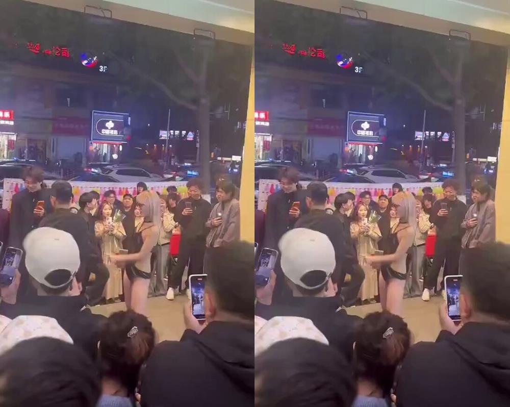 Chấn động MXH Trung Quốc: Giáo viên 35 tuổi livestream cảnh ‘‘ăn kẹo’’ ngay giữa phố đông đúc