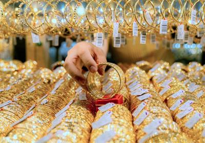 Có nên đổi USD để mua vàng không?